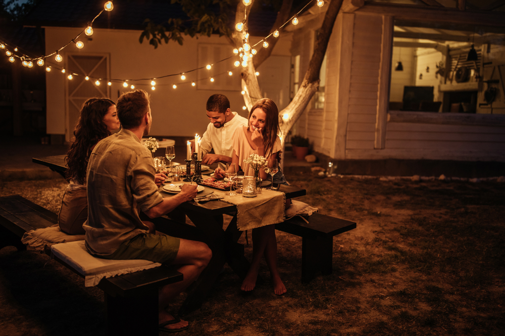 Backyard Gathering with bare patches on lawn